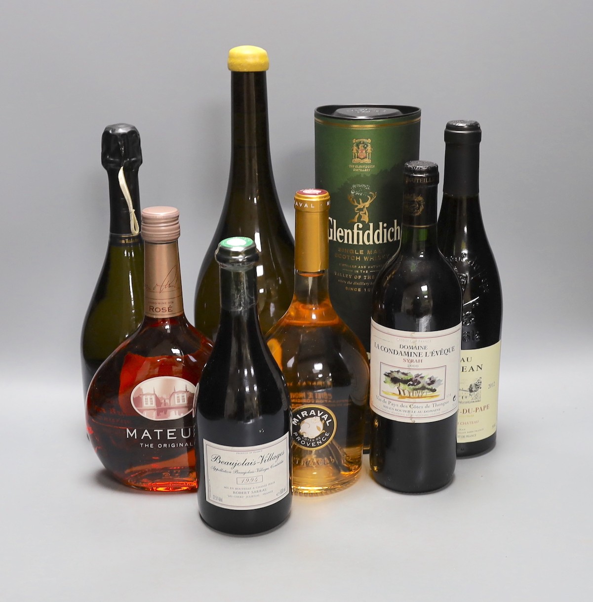 8 bottles of alcohol including cased bottle of Glenfiddich 12 year malt whisky, chateau Saint Jean Chateauneuf-du-pape, a 500ml Beaujolais-villages 1994, a magnum of Chablis premier cru and two bottles of rosé